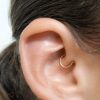 Thin daith hoop earring in sterling silver with diamond cut finish, photo 6