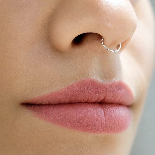 Thin diamond cut septum ring in sterling silver