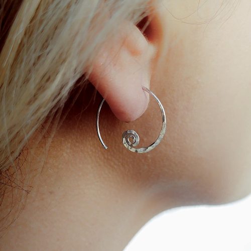 Small open hoop earring with a tiny hammered spiral in sterling silver
