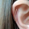 Long curved triangle helix earring in 14k gold filled