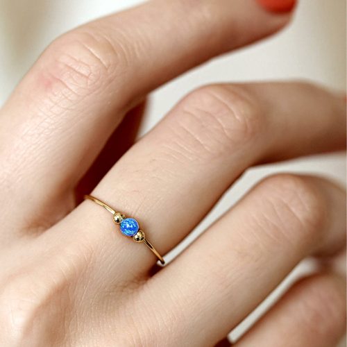 Opal anxiety ring with moving beads in 14k gold filled