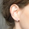 Opal teardrop stud earrings in {material} with a {opal color} opal bead, photo 4