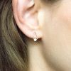 Opal teardrop stud earrings in {material} with a {opal color} opal bead, photo 5