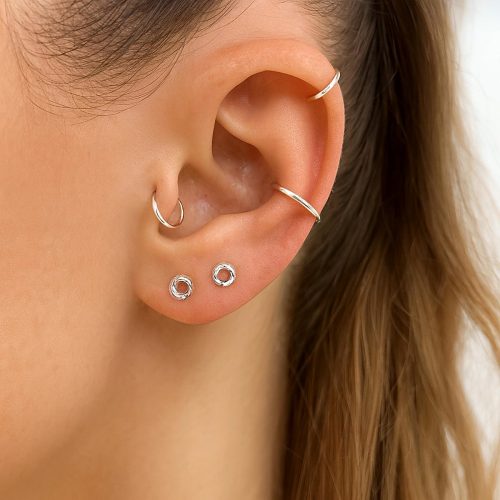 Tiny 3 mm diamond cut circle stud earring in sterling silver