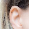 Tiny dot helix stud in 14k gold filled