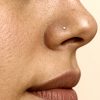 Tiny 2 mm star nose stud in 14k gold filled