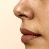 Tiny 2 mm star nose stud in 14k gold filled, photo 2